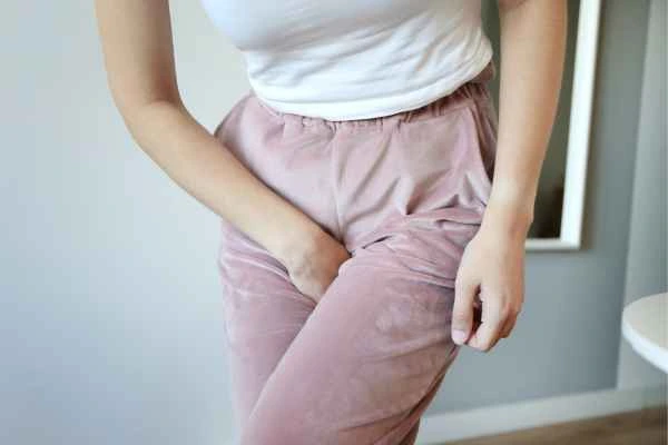 older woman running to the toilet because of urinary incontinence Waltham's Cross